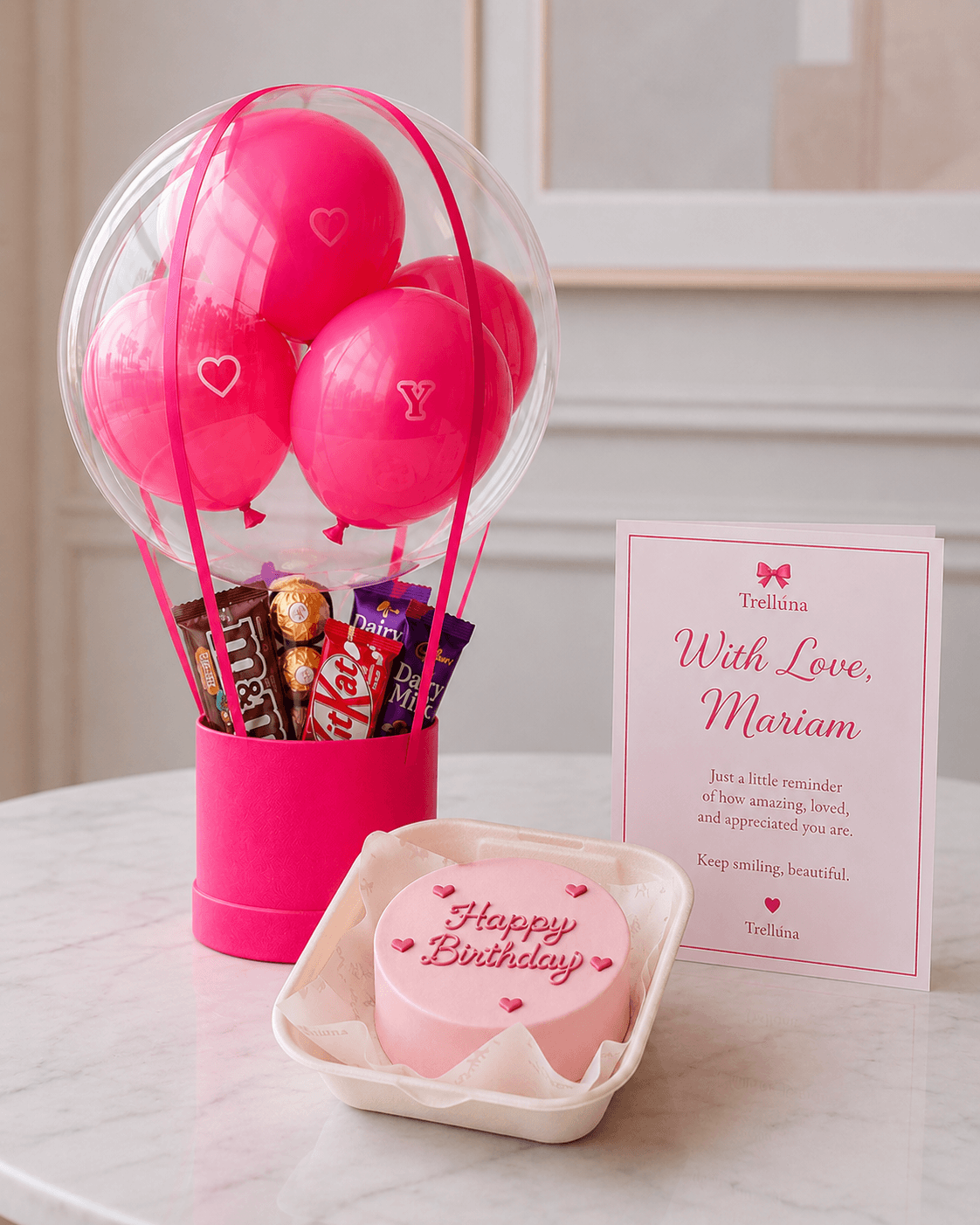Trelluna hot air balloon treats package with bento cake and customised card